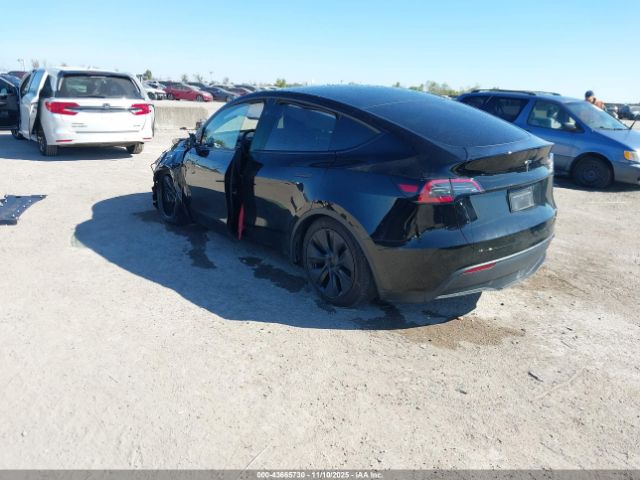 2025 TESLA MODEL Y 7SAYGDED9SA347736 Photo 2