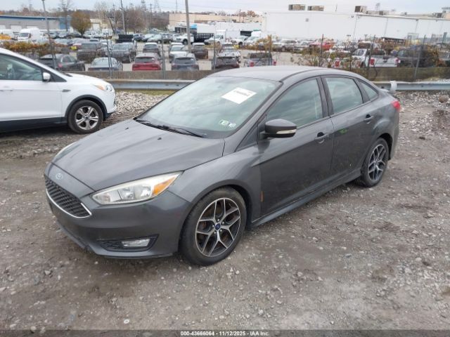 2015 FORD FOCUS 1FADP3F21FL238038 Photo 1