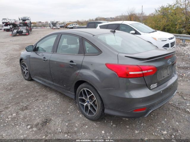 2015 FORD FOCUS 1FADP3F21FL238038 Photo 2