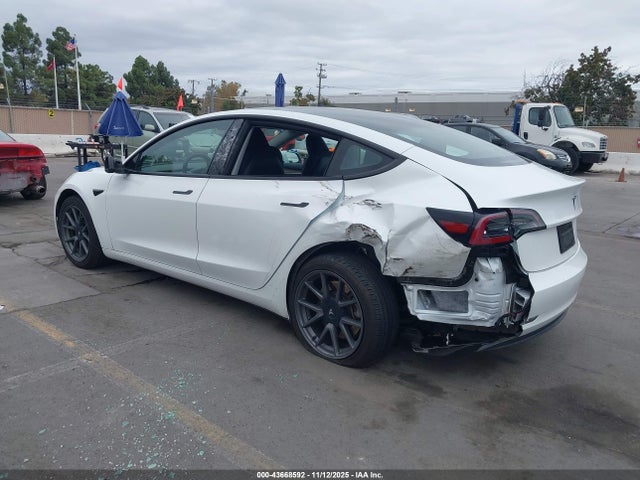 2023 TESLA MODEL 3 5YJ3E1EA3PF560130 Photo 2