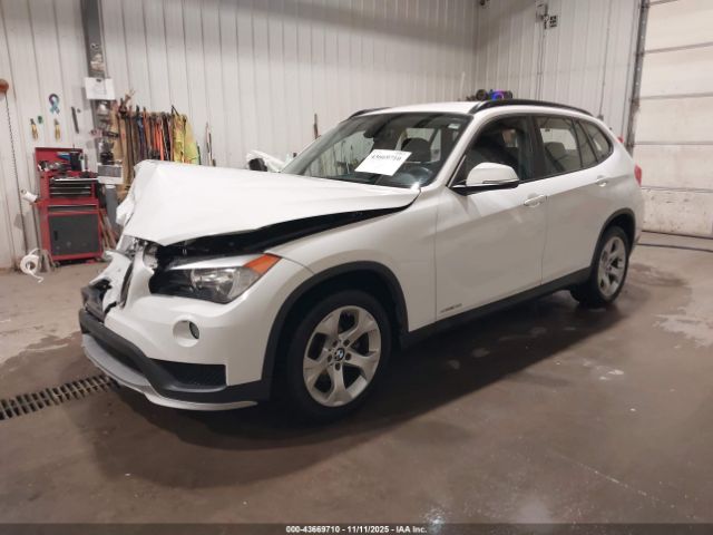 2015 BMW X1 WBAVM1C56FV316051 Photo 1