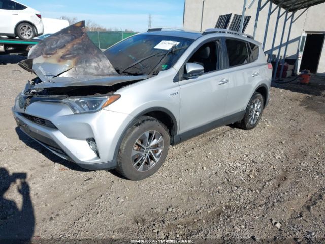 2016 TOYOTA RAV4 HYBRID JTMRJREV8GD031898 Photo 1