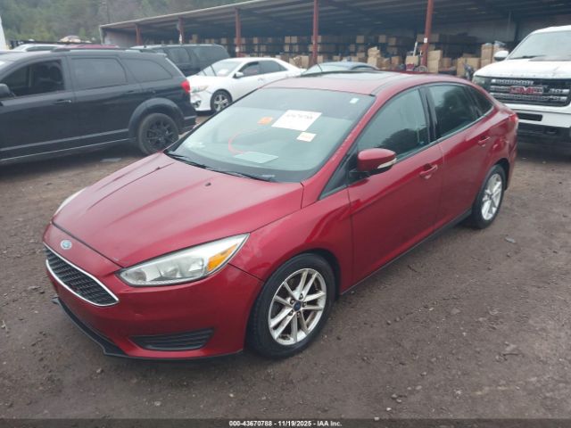 2015 FORD FOCUS 1FADP3F21FL321792 Photo 1