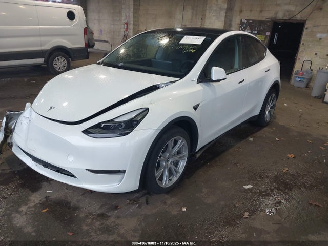 2023 TESLA MODEL Y 7SAYGDEE3PF792413 Photo 1
