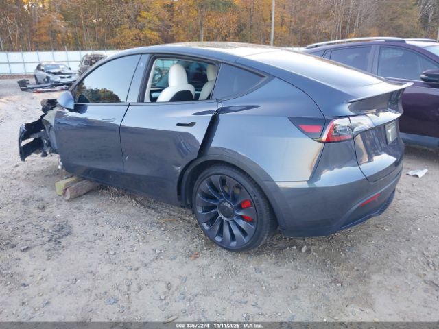 2023 TESLA MODEL Y 7SAYGDEF6PF701384 Photo 2