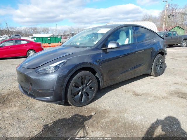 2024 TESLA MODEL Y 7SAYGDEE6RA321209 Photo 1