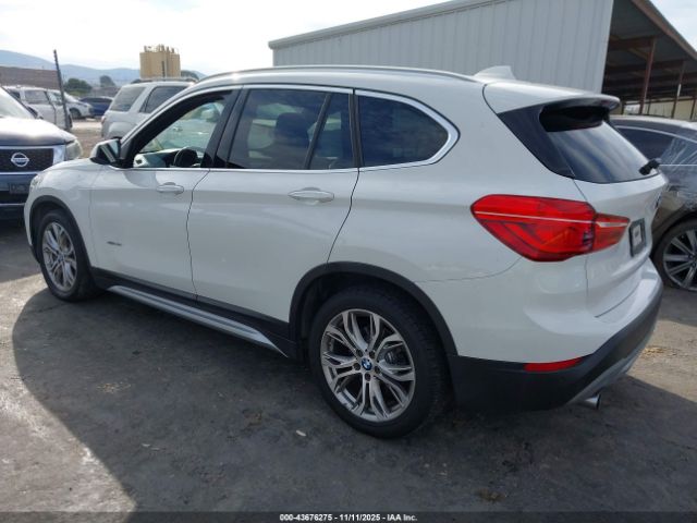 2017 BMW X1 WBXHT3C36H5F83048 Photo 2