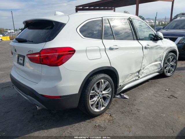 2017 BMW X1 WBXHT3C36H5F83048 Photo 3
