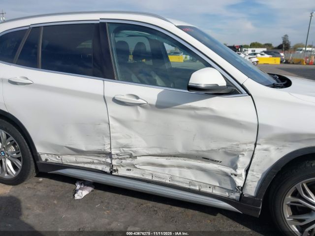 2017 BMW X1 WBXHT3C36H5F83048 Photo 5