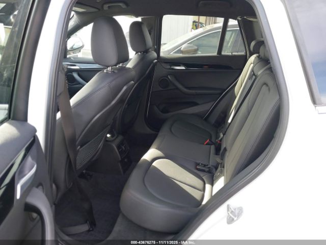 2017 BMW X1 WBXHT3C36H5F83048 Photo 7