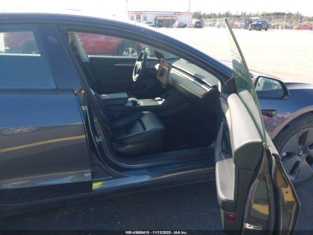 2023 TESLA MODEL 3 5YJ3E1EAXPF405543 Photo 4