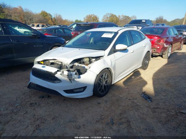 2015 FORD FOCUS 1FADP3F2XFL298562 Photo 1