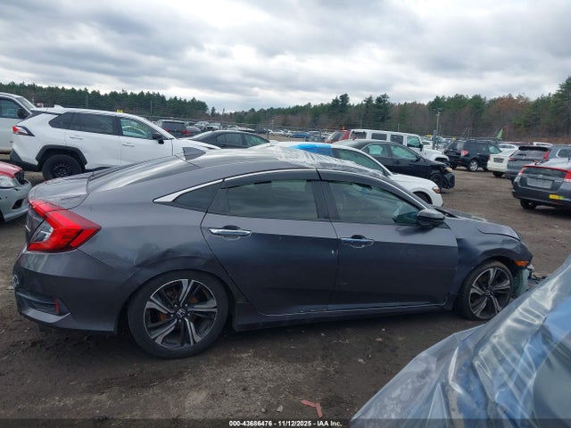 JHMFC1F93JX009554 Honda Civic Touring