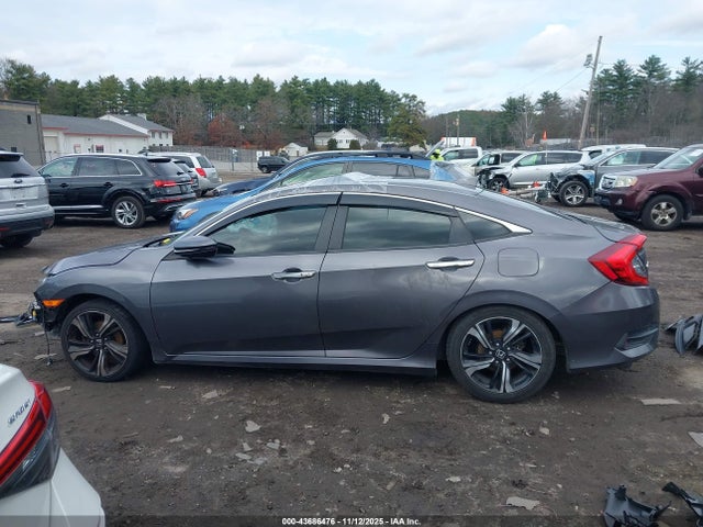 JHMFC1F93JX009554 Honda Civic Touring
