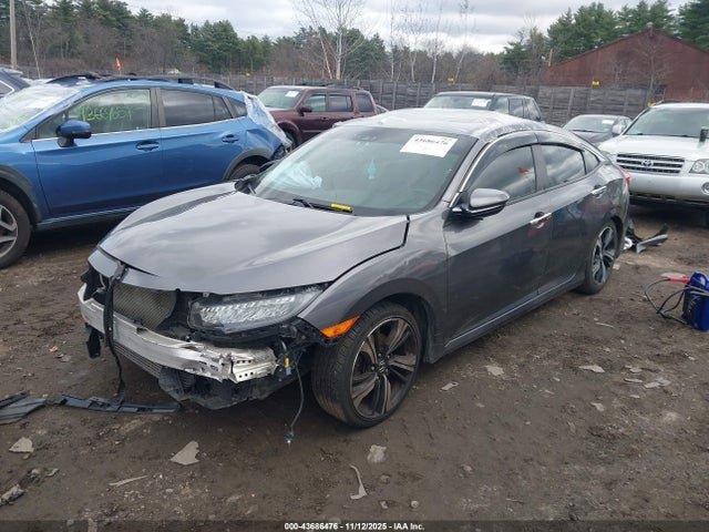 JHMFC1F93JX009554 Honda Civic Touring