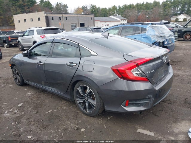JHMFC1F93JX009554 Honda Civic Touring