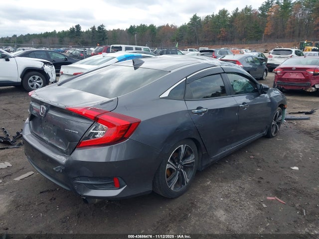 JHMFC1F93JX009554 Honda Civic Touring