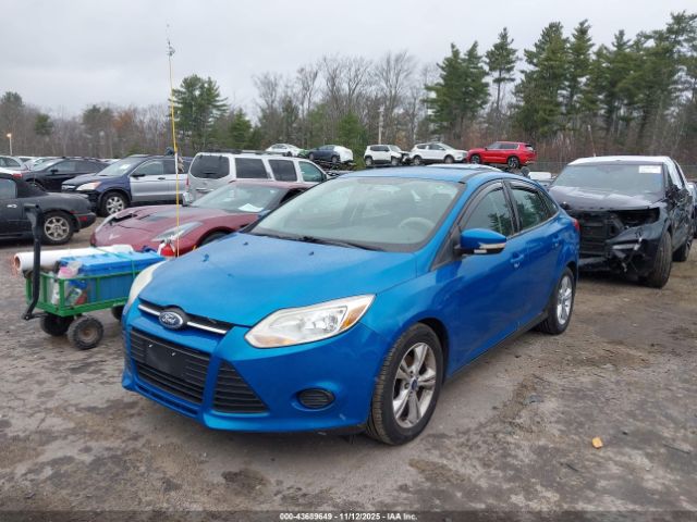 2014 FORD FOCUS 1FADP3F22EL284976 Photo 1