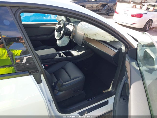 2023 TESLA MODEL Y 7SAYGDEF9PF665514 Photo 4