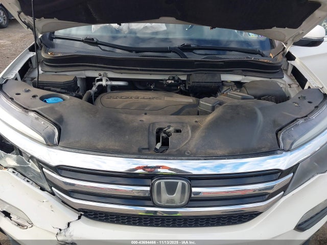 5FNYF6H04HB022847 Honda Pilot Elite