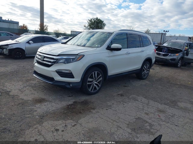 5FNYF6H04HB022847 Honda Pilot Elite
