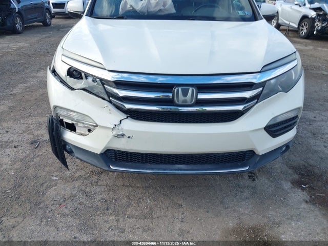 5FNYF6H04HB022847 Honda Pilot Elite