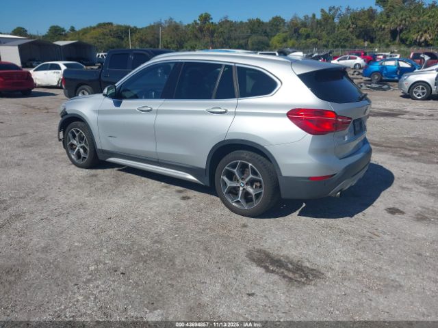 2017 BMW X1 WBXHT3C32H5F86240 Photo 2