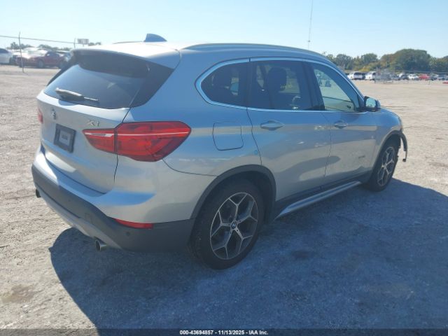 2017 BMW X1 WBXHT3C32H5F86240 Photo 3