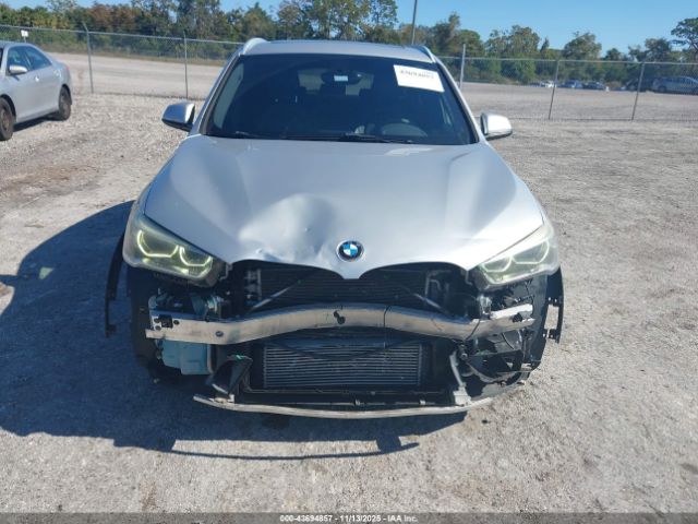 2017 BMW X1 WBXHT3C32H5F86240 Photo 5