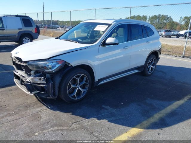 2018 BMW X1 WBXHT3C38J3H30018 Photo 1