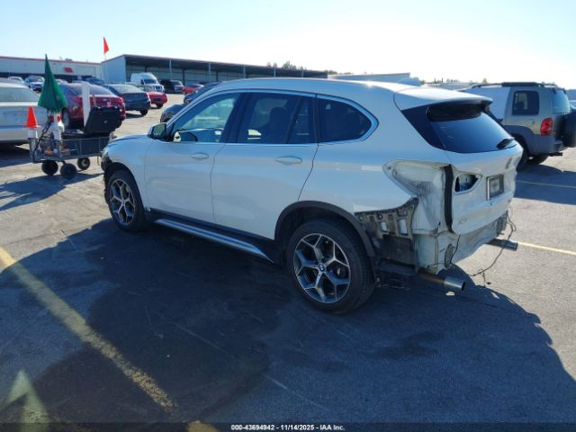 2018 BMW X1 WBXHT3C38J3H30018 Photo 2