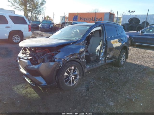 2018 TOYOTA RAV4 HYBRID JTMRJREV3JD165760 Photo 1