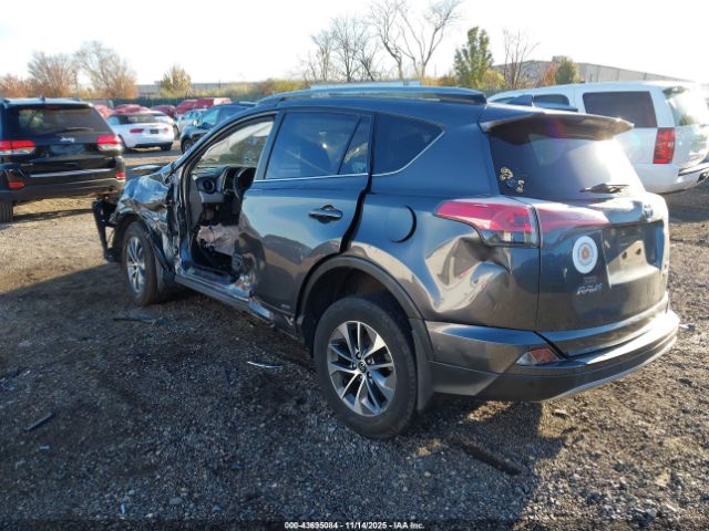 2018 TOYOTA RAV4 HYBRID JTMRJREV3JD165760 Photo 2