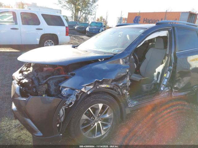 2018 TOYOTA RAV4 HYBRID JTMRJREV3JD165760 Photo 5