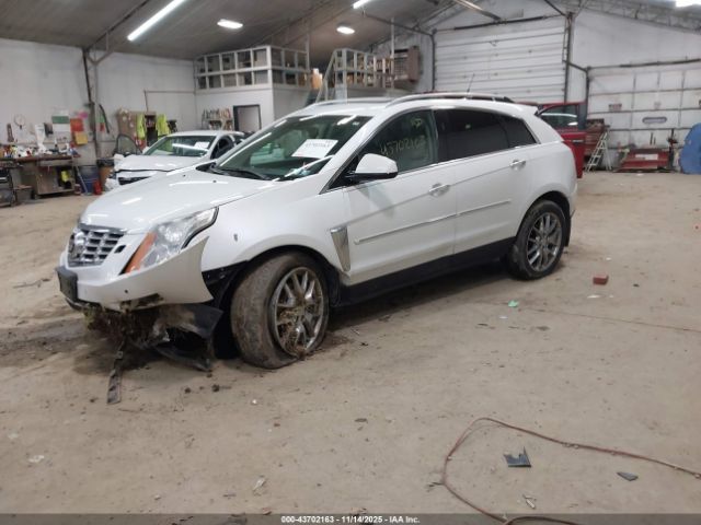 2014 CADILLAC SRX 3GYFNFE36ES654593 Photo 1