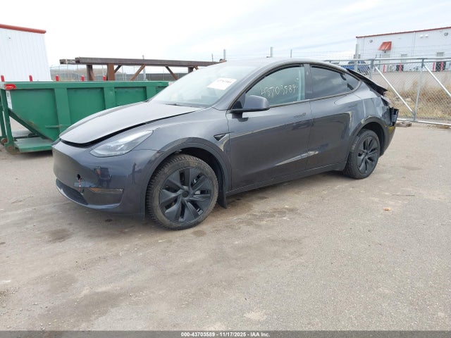 2024 TESLA MODEL Y 7SAYGDEE1RA321795 Photo 1