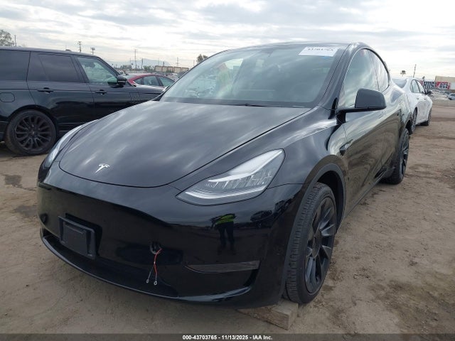 2023 TESLA MODEL Y 7SAYGDEE1PA109217 Photo 1
