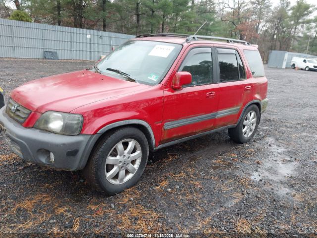 1999 HONDA CR-V JHLRD1860XC085301 Photo 1