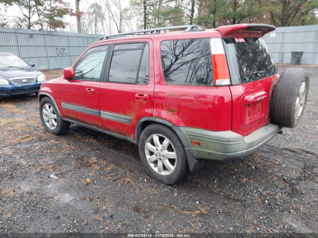 1999 HONDA CR-V JHLRD1860XC085301 Photo 2