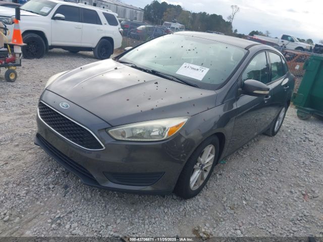 2015 FORD FOCUS 1FADP3F26FL353976 Photo 1