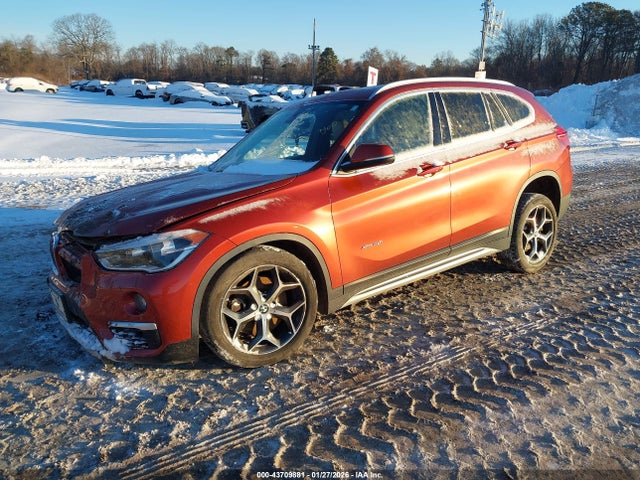 2018 BMW X1 WBXHT3C37J5K21409 Photo 1