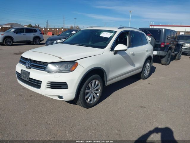 2011 VOLKSWAGEN TOUAREG WVGFF9BP9BD007527 Photo 1