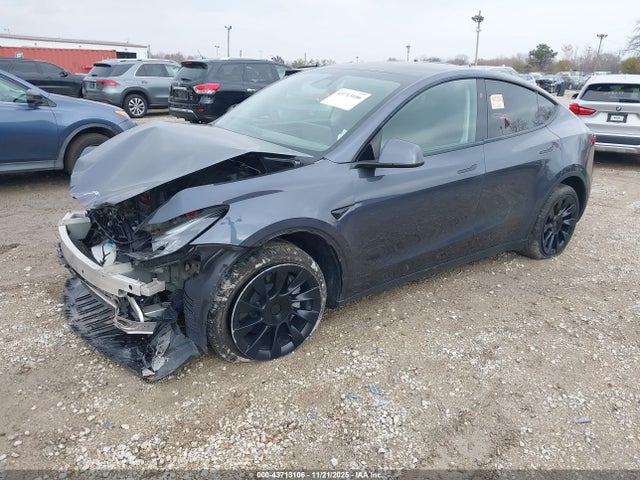 2023 TESLA MODEL Y 7SAYGAEEXPF976827 Photo 1