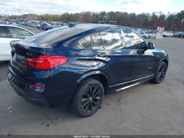 2015 BMW X4 5UXXW5C52F0E88010 Photo 3