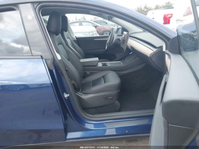 2023 TESLA MODEL Y 7SAYGDEF1PF834554 Photo 4