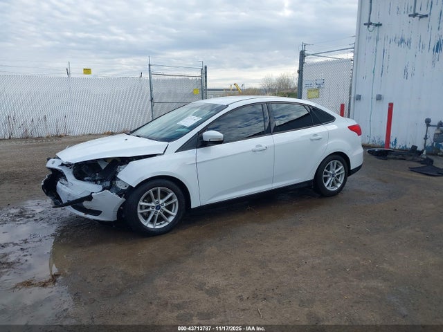 2015 FORD FOCUS 1FADP3F23FL262356 Photo 1