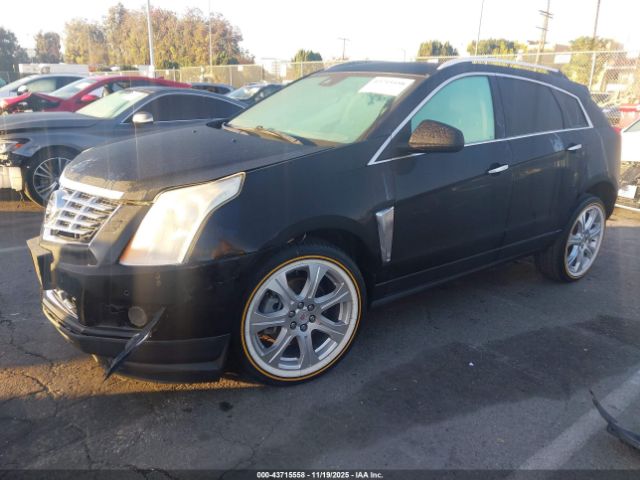 2014 CADILLAC SRX 3GYFNDE34ES663538 Photo 1