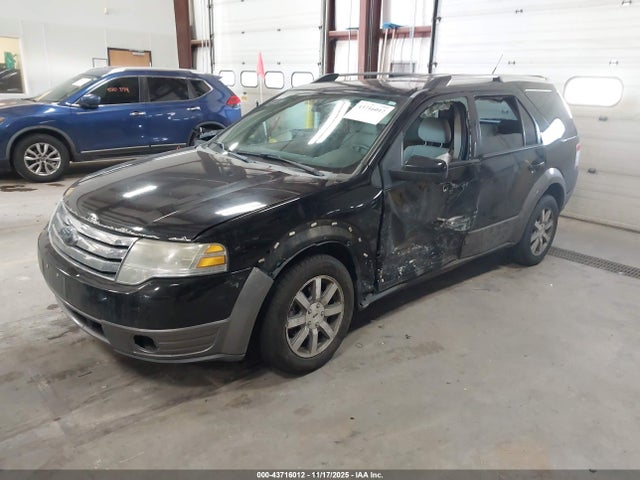2008 FORD TAURUS X 1FMDK02W08GA44270 Photo 1