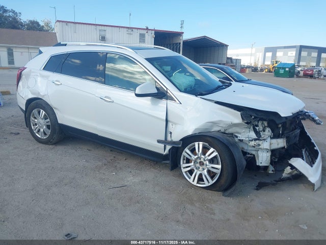 2013 CADILLAC SRX 3GYFNGE39DS525557 Photo 0