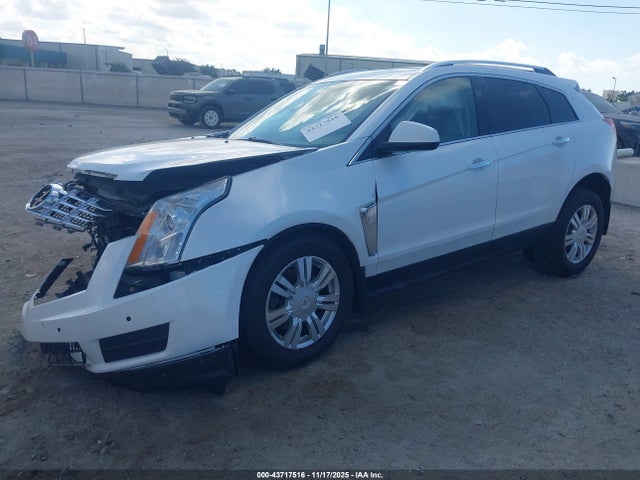 2013 CADILLAC SRX 3GYFNGE39DS525557 Photo 1